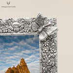 Load image into Gallery viewer, Elegant Butterfly Dreams Silver Photo Frame for Chic Home Decor - Stylish Picture Display FrameButterfly Dreams Silver Photo Frame - an exquisite Indian handicraft showcasing a delicate butterfly design, perfect for home decor. This elegant metal craft product enhances your kitchenware and lifestyle, ideal for displaying cherished 4x6 inch memories or gifting for special occasions like weddings or anniversaries.
