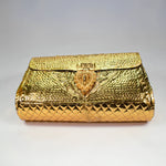 Load image into Gallery viewer, Luxurious embossed golden clutch with intricate metal patterns – perfect for evening events, weddings, and fashion-forward accessories – by Tanutra Indian craftsmanship
