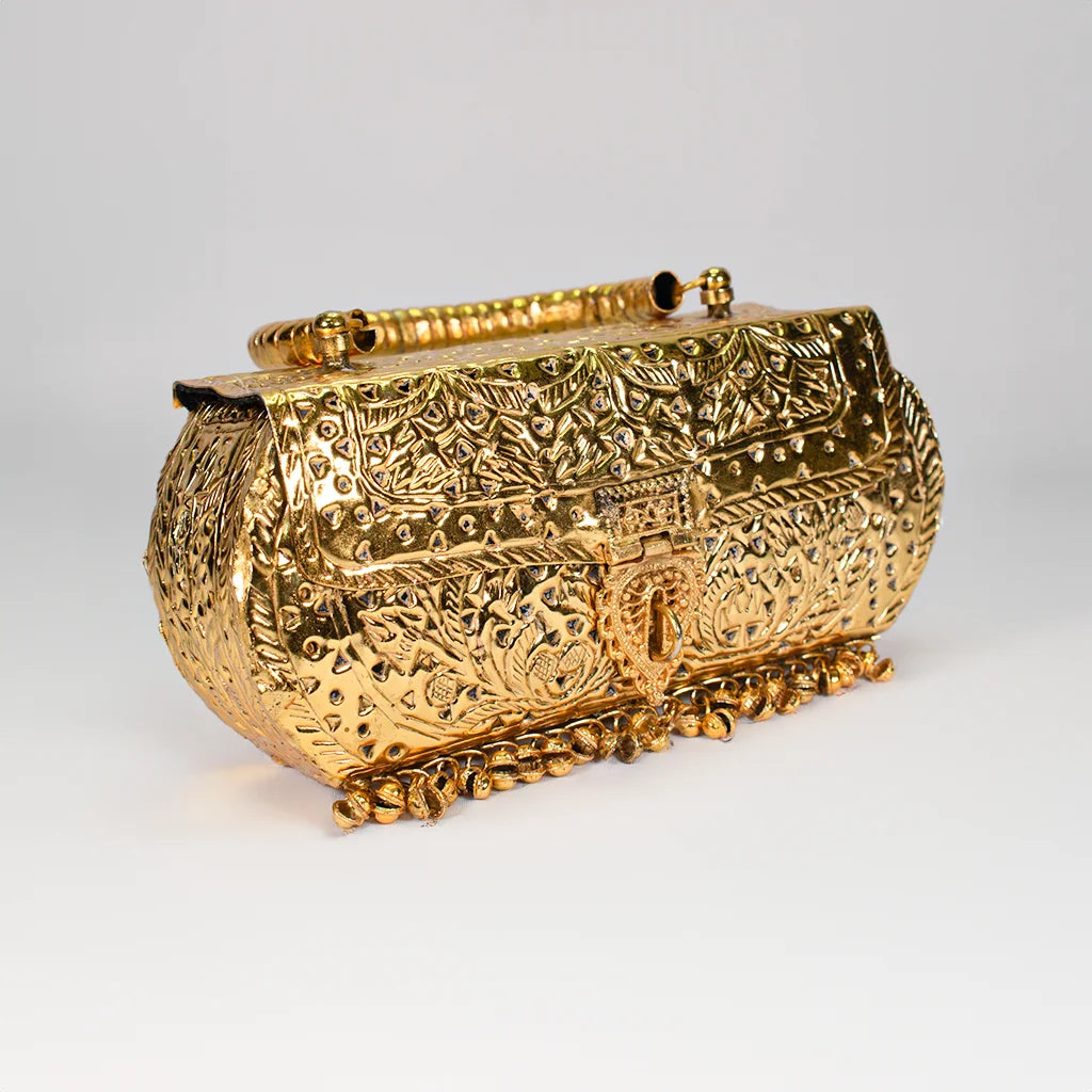 Golden Handcrafted Clutch by Tanutra - Exquisite embossed design, luxurious wedding accessory, traditional Indian craftsmanship perfect for cultural events, gifting, and special occasions. Handcrafted 