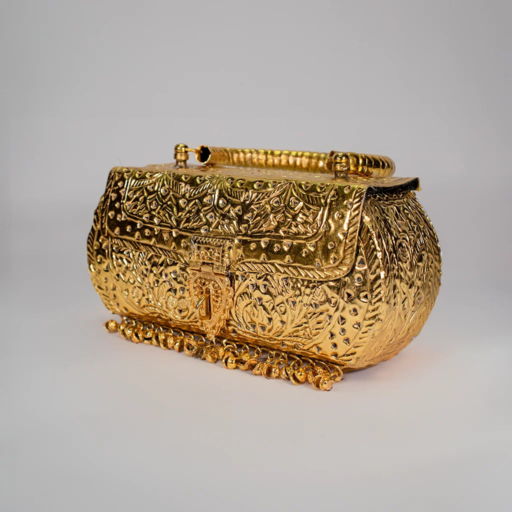 Golden Handcrafted Clutch by Tanutra - Exquisite embossed design, luxurious wedding accessory, traditional Indian craftsmanship perfect for cultural events, gifting, and special occasions. Handcrafted 