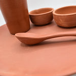 Load image into Gallery viewer, Rustic Harmony Dining Set by Tanutra - Handcrafted clay dinnerware set including plate, tumbler, bowls, and spoon, perfect for everyday meals, special occasions, and culinary presentations. Indian craftsmanship by Gola Clay Art.
