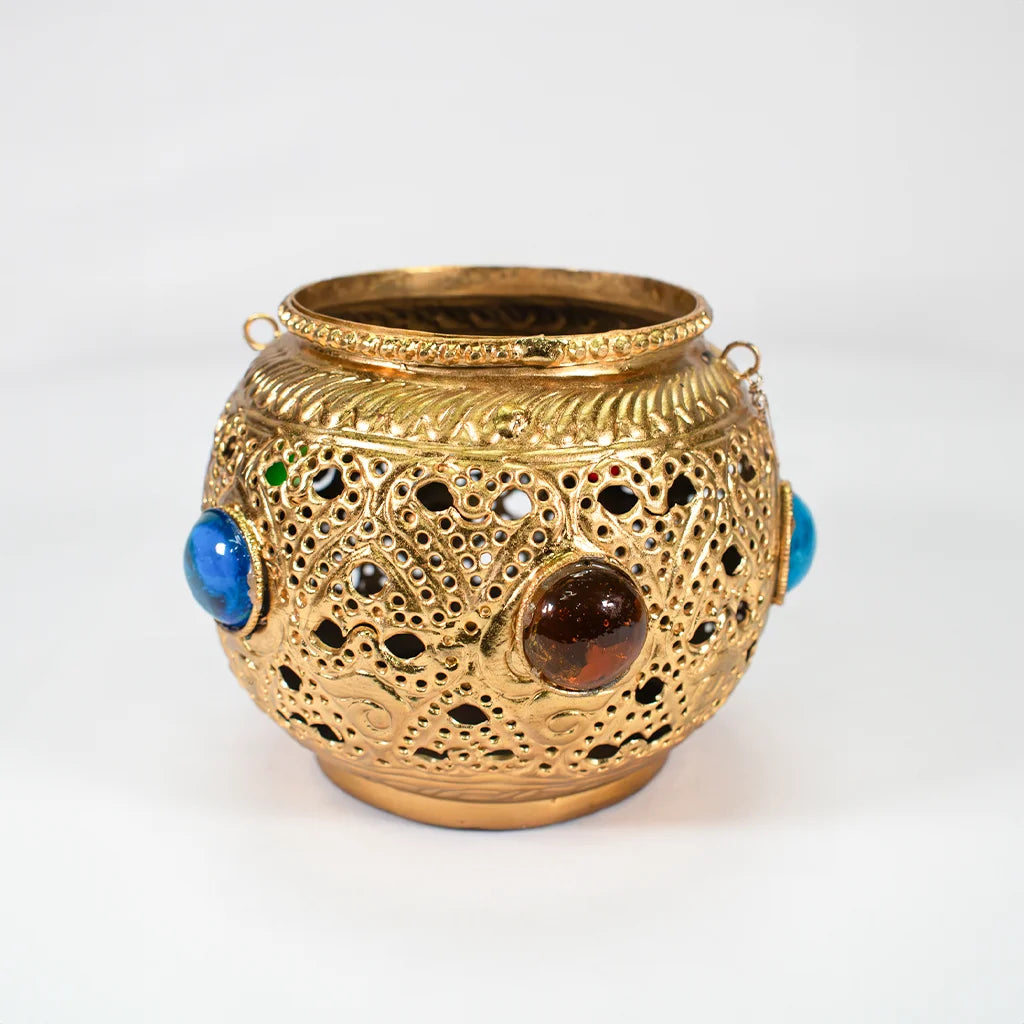 Indian  Handicraft Product Radiant Treasure Lantern
Radiant Treasure Lantern - Intricately Designed Metal Lantern with Colorful Gemstones | Luxury Home Decor & Ambient Lighting | Perfect for Meditation, Events, and Gift Ideas | Indian Handicraft by Tanutra