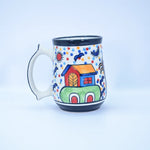 Load image into Gallery viewer, Sunny Village Mug - Hand-painted Ceramic Coffee and Tea Mug with Vibrant Village Scene - Artistic Homeware for Desk Décor, Gifting, and Display - Part of Tanutra&#39;s Ceramic Arts Collection
