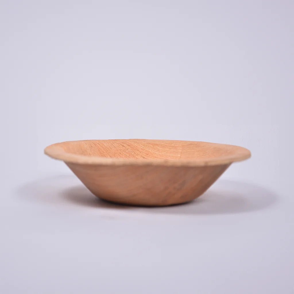 Eco-friendly Palm Bowl made from natural areca palm leaves by Tanutra - biodegradable, sustainable dining option for outdoor events, parties, and eco-conscious gatherings.