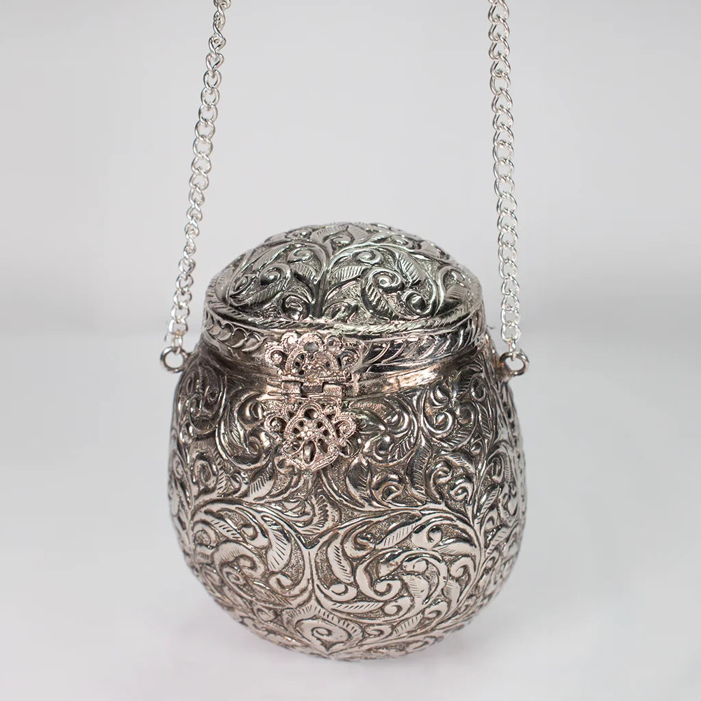 "Ornate Silver Purse – Exquisite Aluminum Handicraft Adding Modern Elegance to Home Decor by Tanutra Handicrafts.