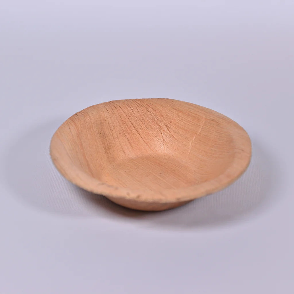 Eco-friendly Palm Bowl made from natural areca palm leaves by Tanutra - biodegradable, sustainable dining option for outdoor events, parties, and eco-conscious gatherings.