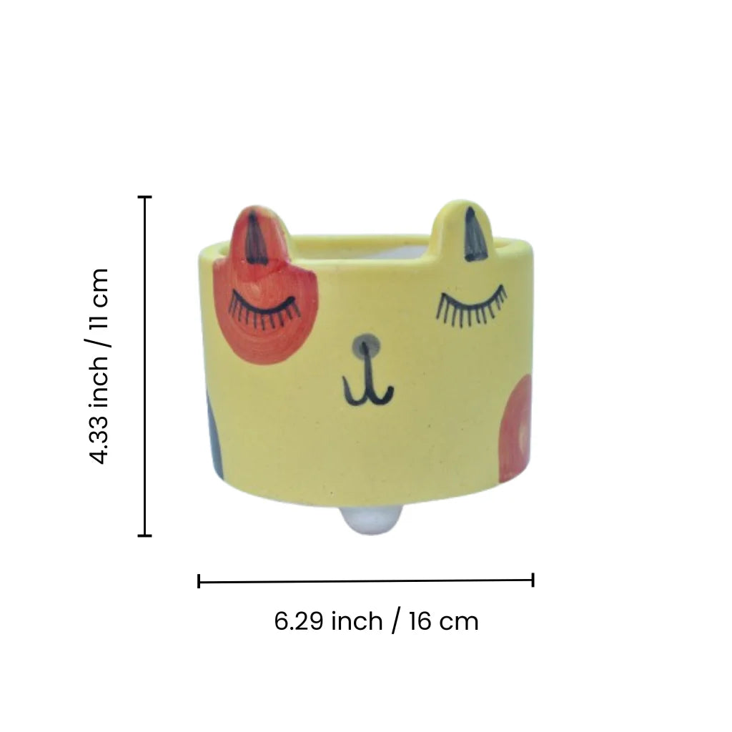 Sunny Critter Planter - Animal-inspired ceramic planter with a cheerful yellow finish, perfect for small plants, succulents, or herbs. Playful home decor accent from Tanutra's Ceramic Arts collection.